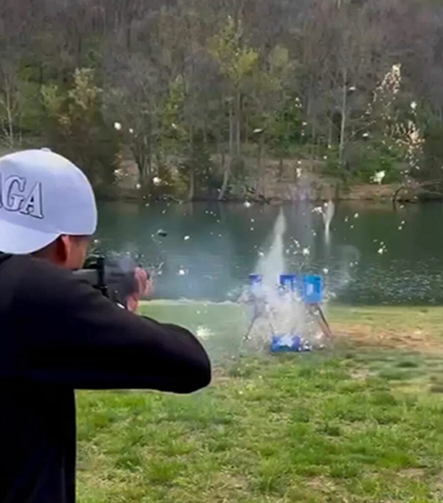 Kid Rock shooting cans of Bud Light